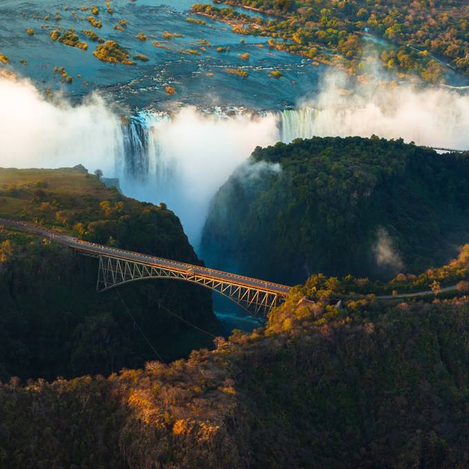 Aerial view of Victoria Falls and the bridge over the Zambezi gorge