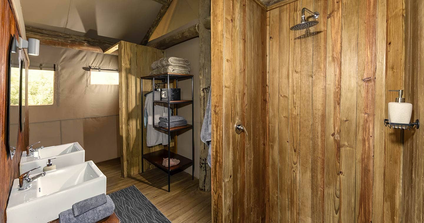 Ensuite bathroom inside a tented suite at Camp Khwai safari camp