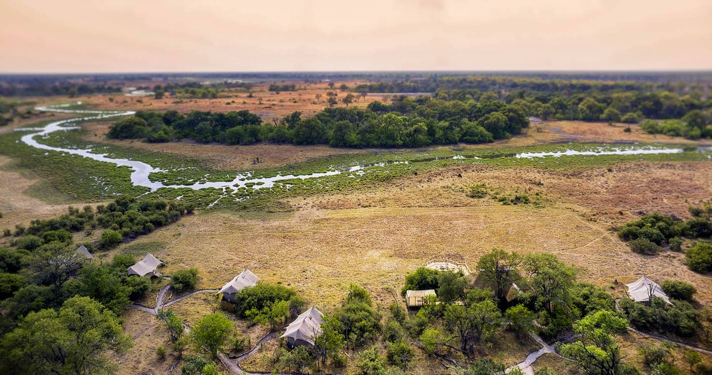 Aerial view of Camp Khwai safari lodge on the Khwai River, Moremi Game Reserve