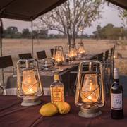 Lanterns and Letaka wine on a bush dinner table