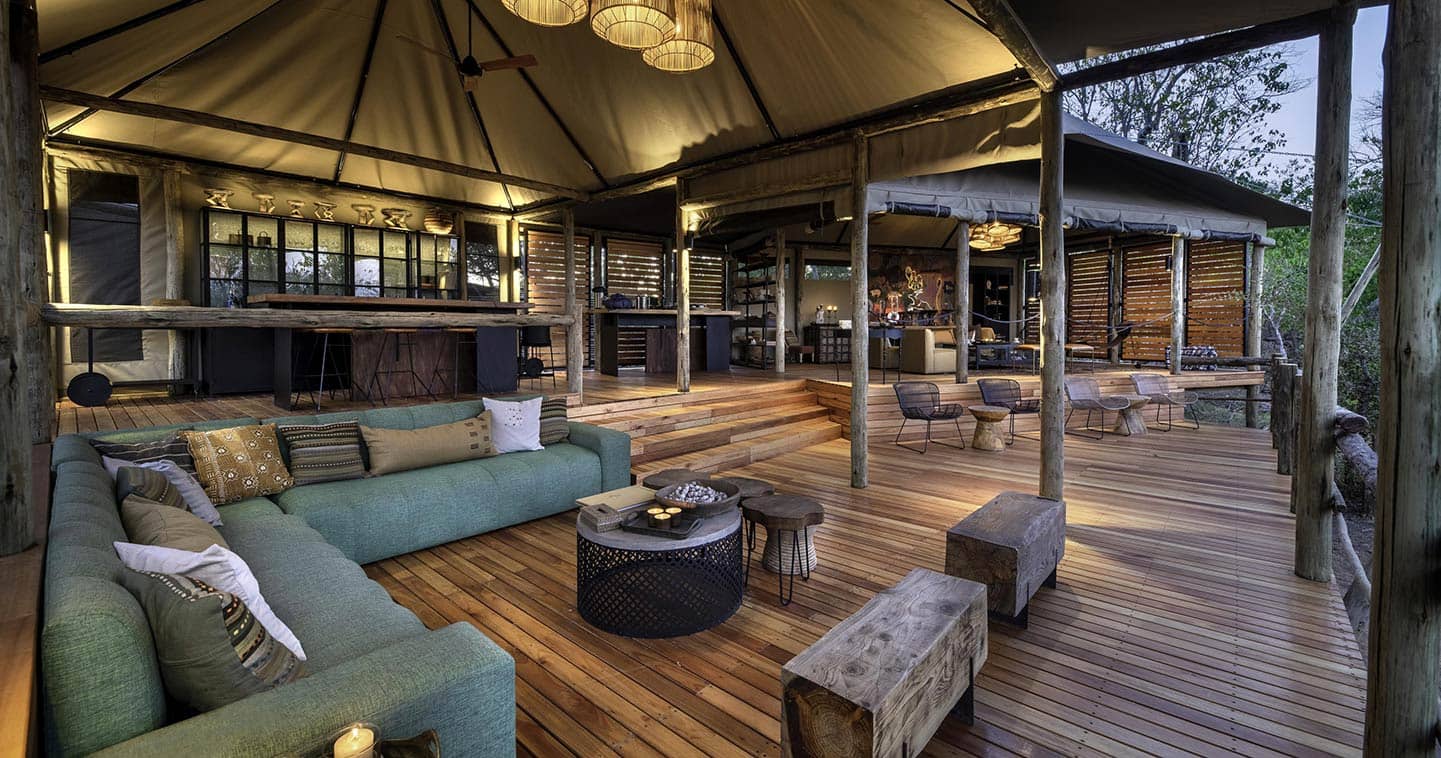 Open-air lounge and dining area at Khwai Lediba safari camp