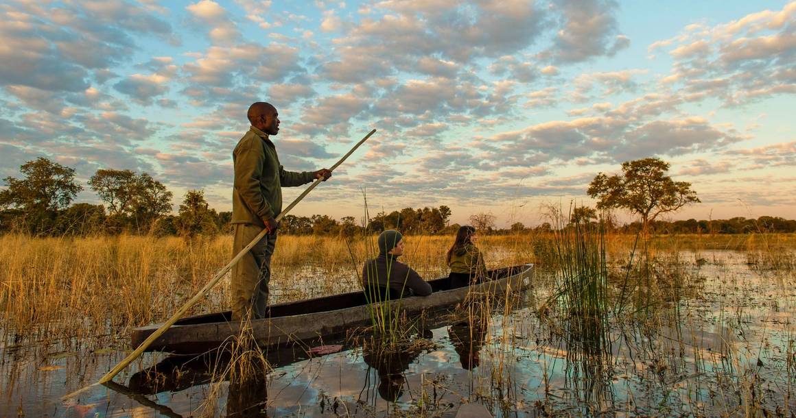 Mokoro excursion with guide on the Khwai channels at golden hour