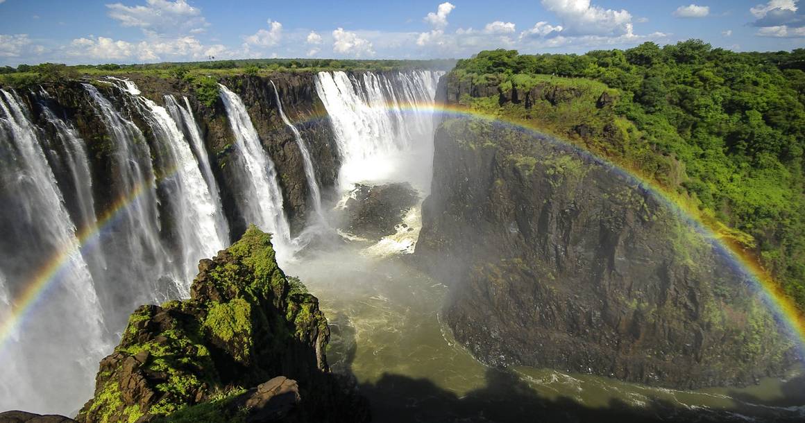 Victoria Falls gorge with double rainbow from the Zimbabwe side